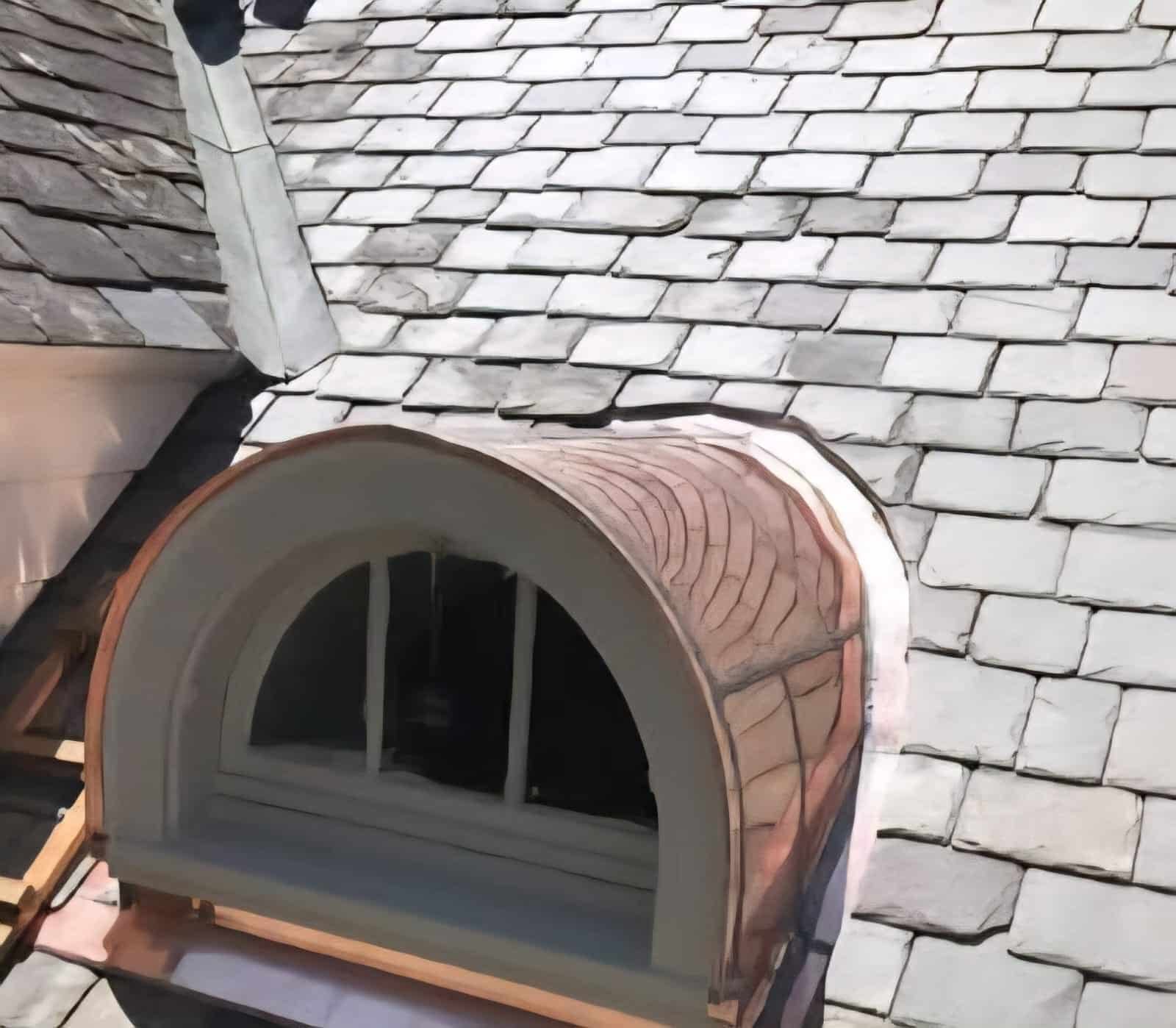 Curved dormer clad and slated