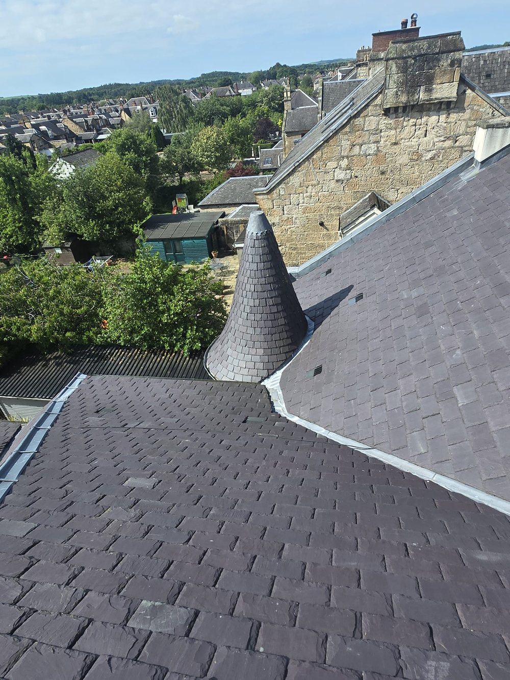 Conical turret roof re-slated by CB Roofing